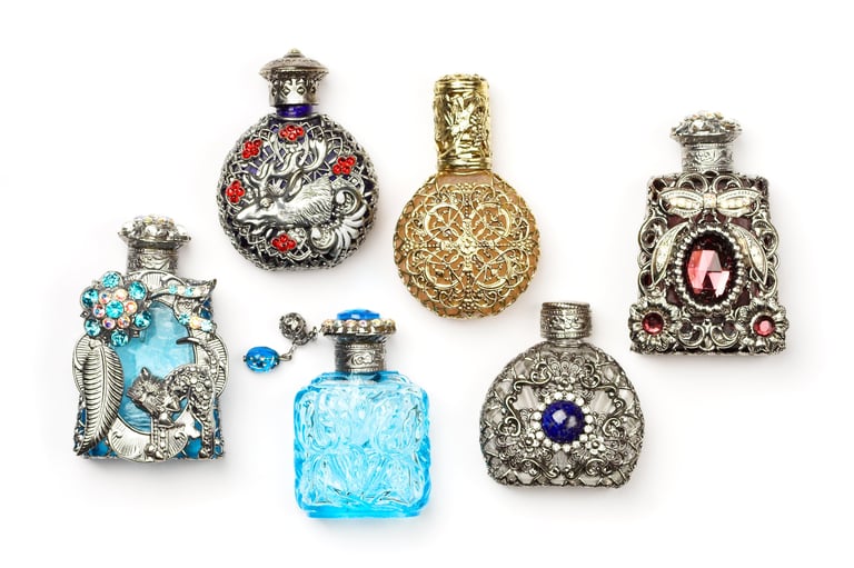 Decorative vintage perfume bottles with ornate stoppers