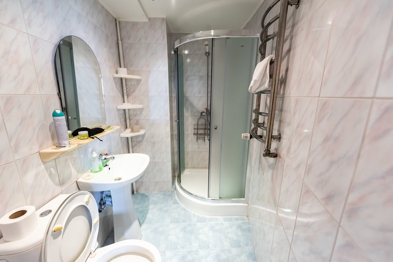 Shower caddy corner organizer hanging in bathroom