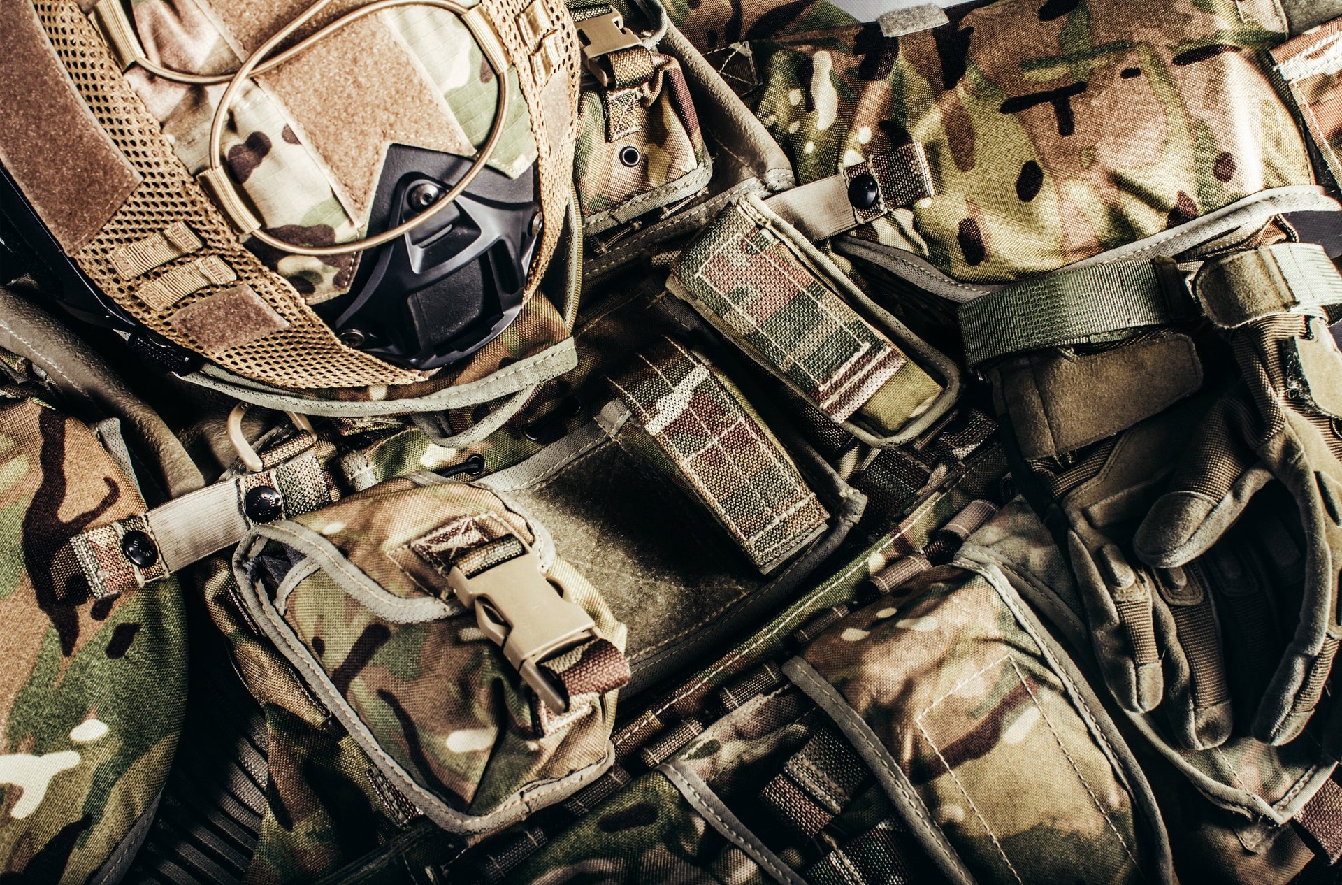 Tactical protective equipment and armor systems laid out for inspection