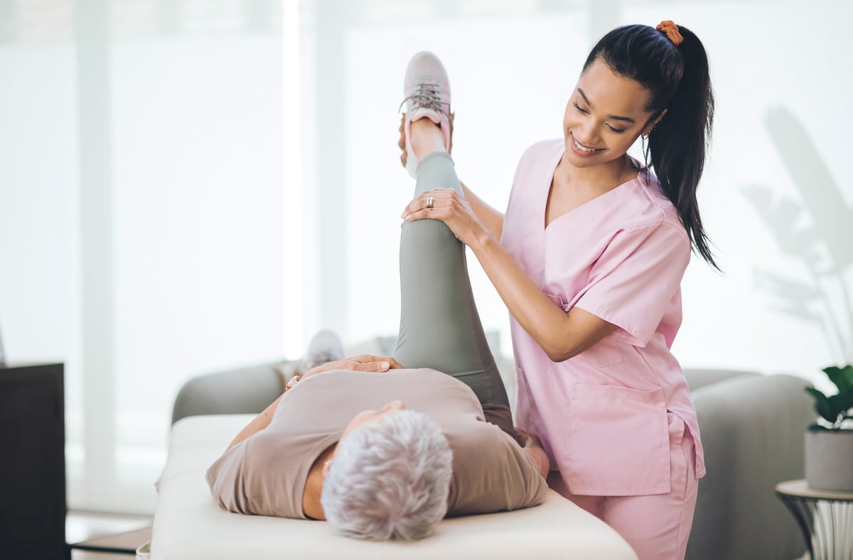 Physiotherapist working with a patient