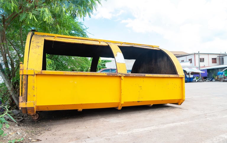 Yellow tub truck as temporary garbage dump