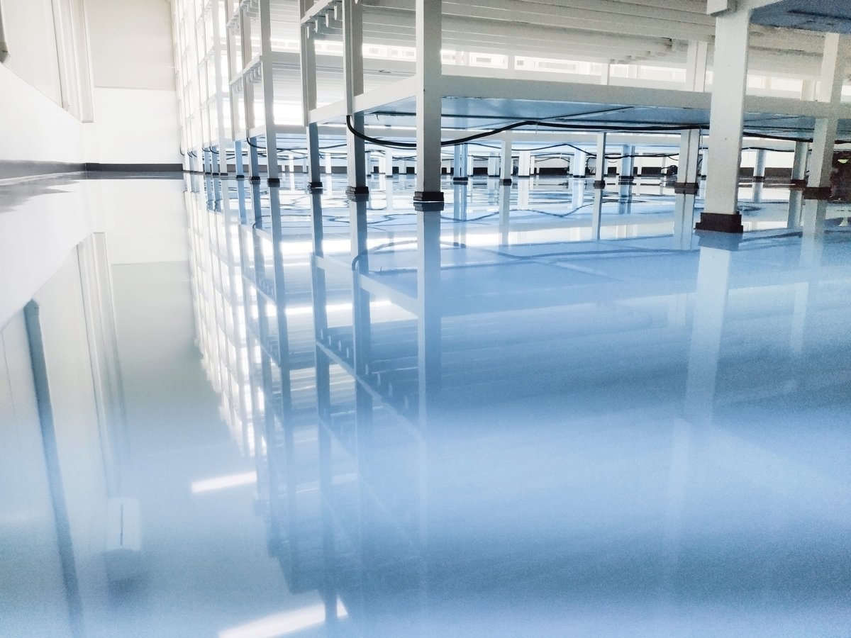 Sealed concrete floor with protective coating