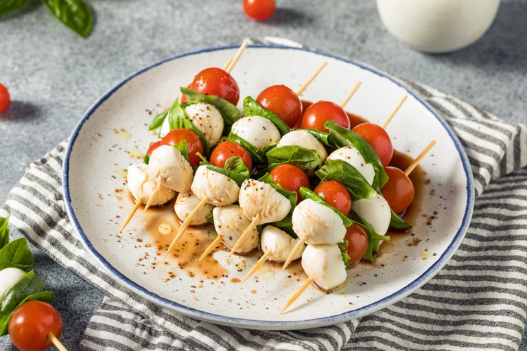 Fresh caprese skewer appetizer with tomato, basil, and mozzarella