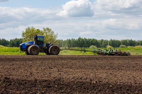 Powerful New Holland tractor in action