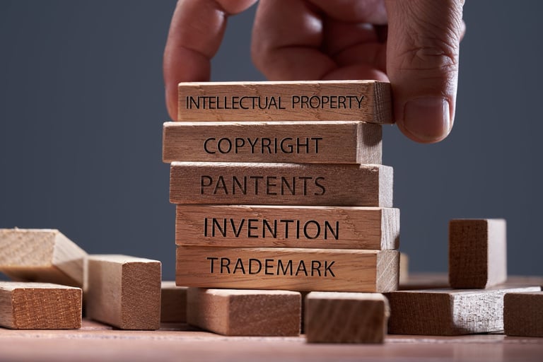 Intellectual property blocks showing copyright, patents, invention, and trademark concepts
