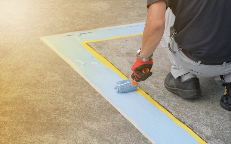Professional parking lot line striping in progress