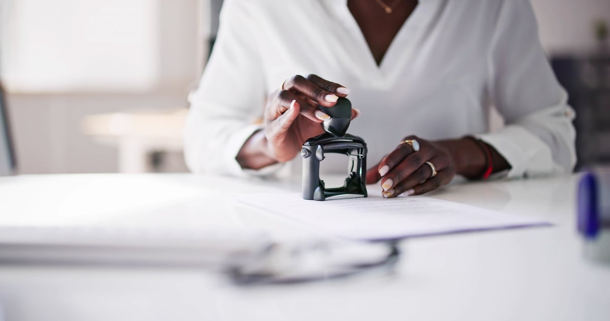 Professional notary stamping documents