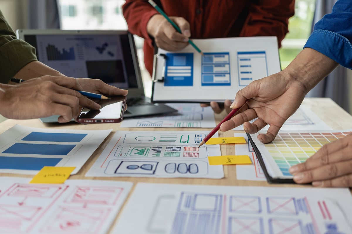 A team of web designers working together on a modern website project