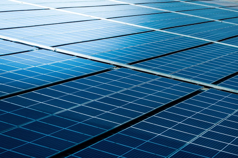 Close-up of solar cell farm power plant — sustainable resources concept