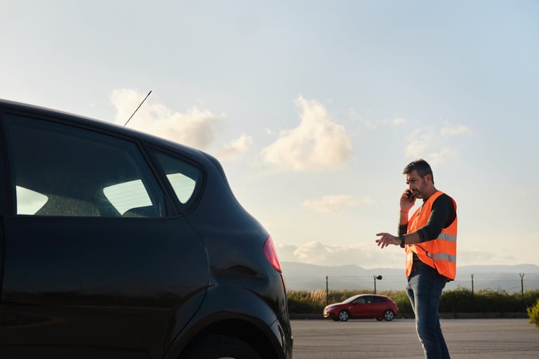 K&L Towing team member assisting a driver on the roadside