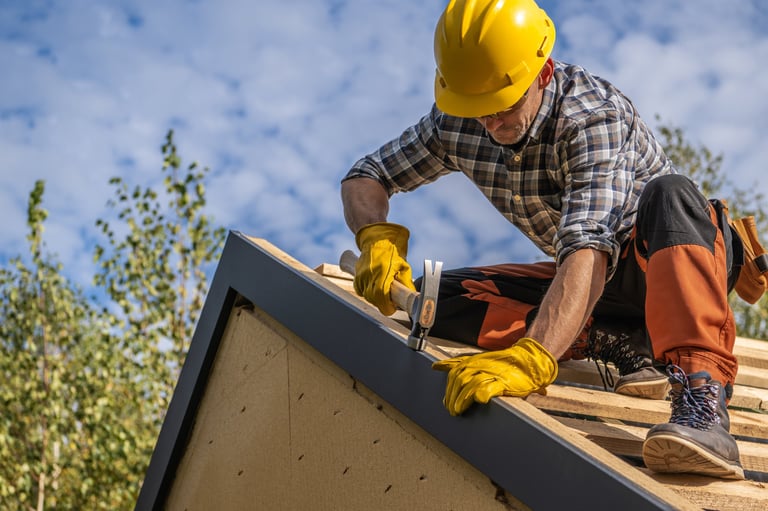 Professional roof contractor on the job