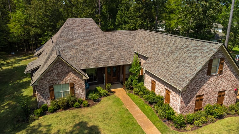Home with architectural shingle roof — Northwest Florida roofing project