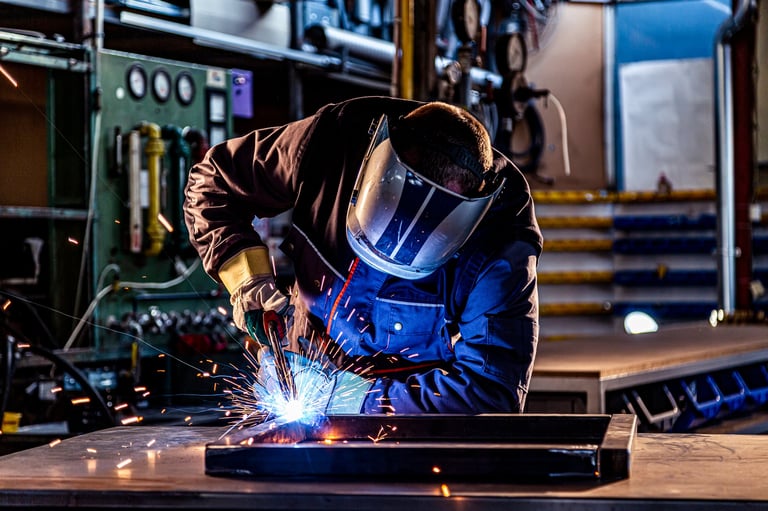 Industrial welding at the factory with precision equipment