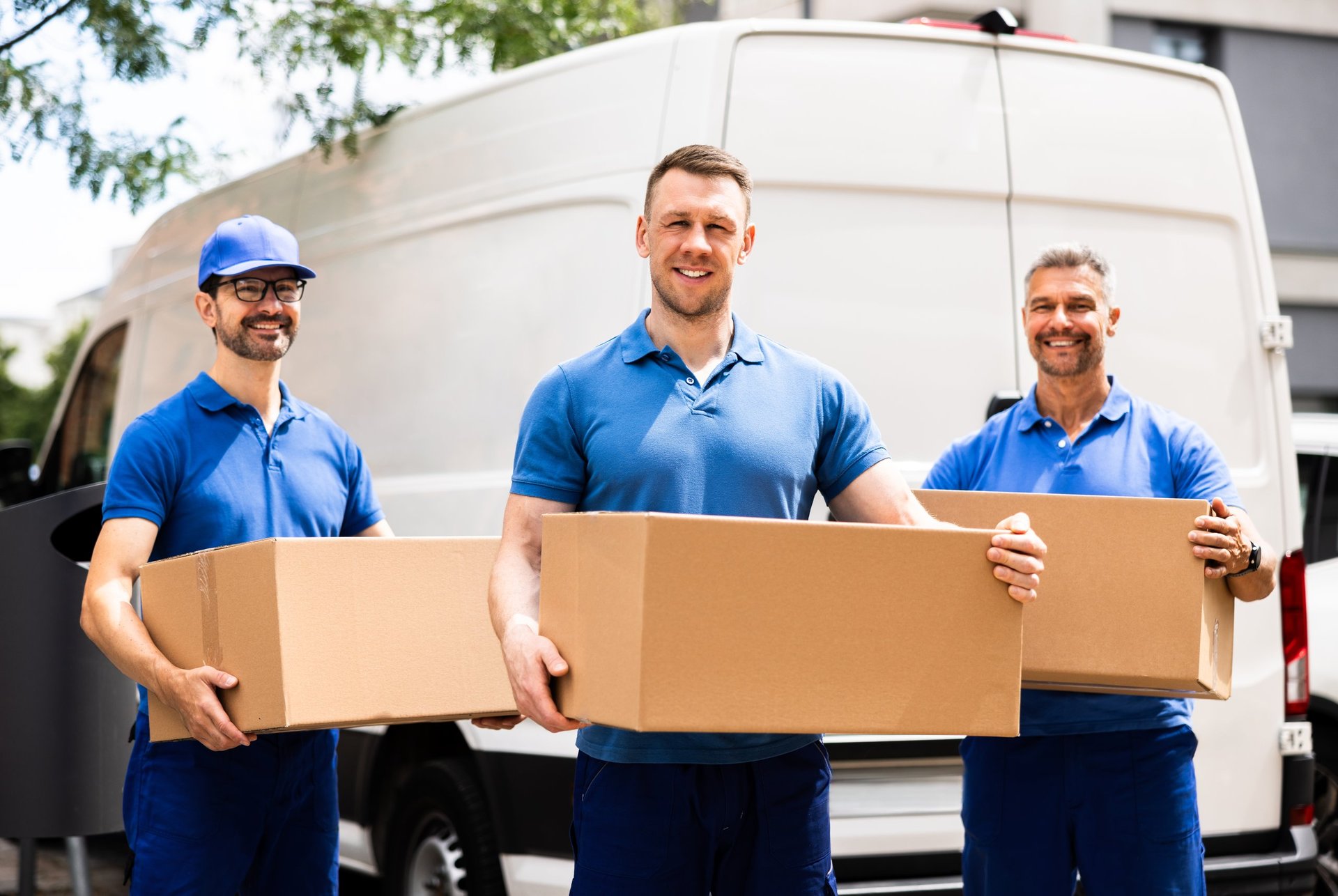 Professional movers loading a moving van
