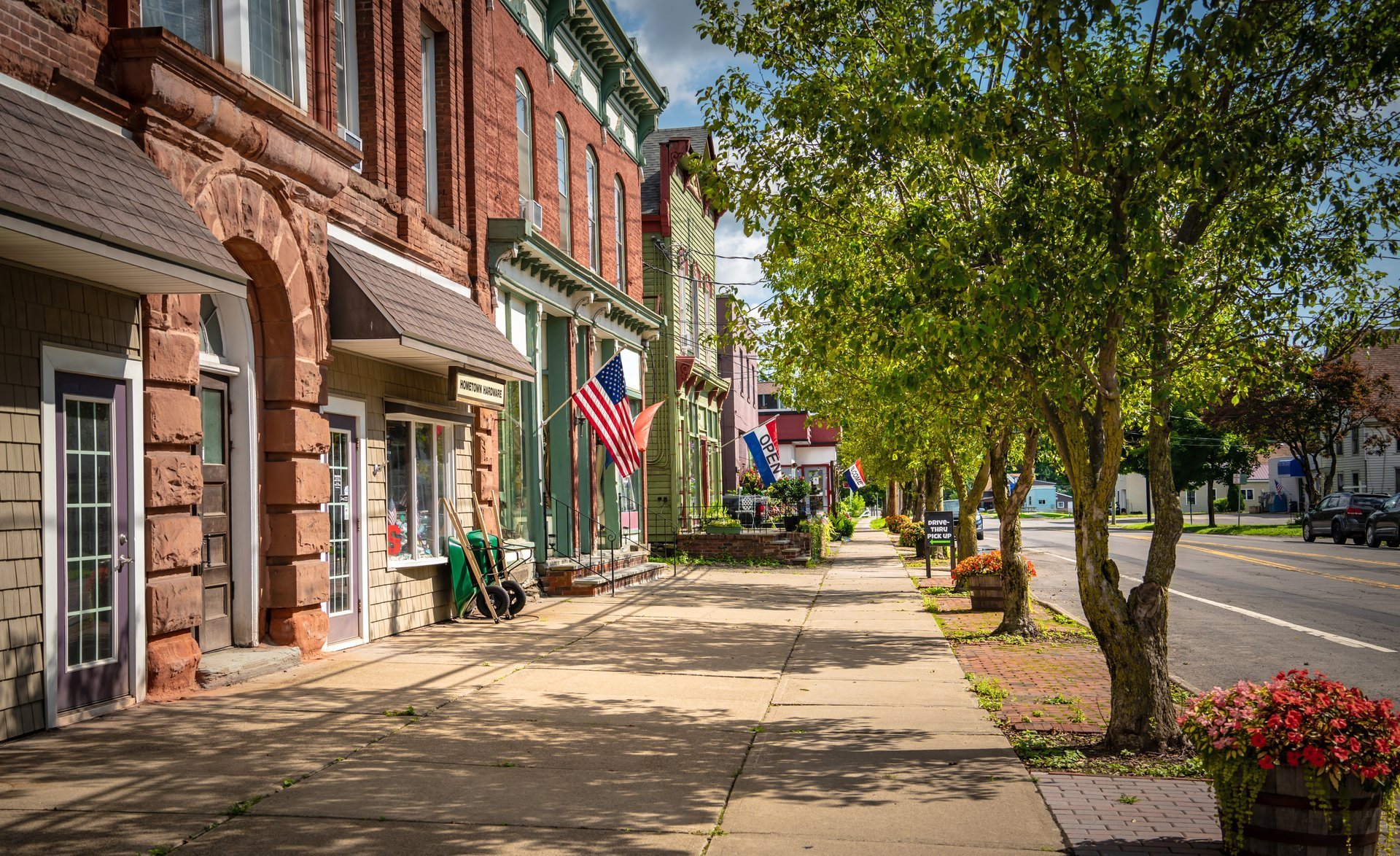 Storefronts along Main Street in a small American town on a summer day