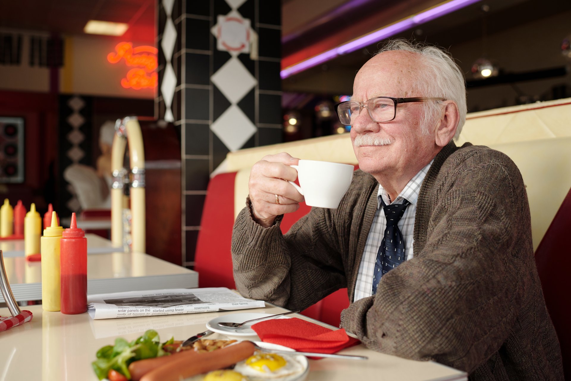 Guest enjoying coffee in a classic retro diner