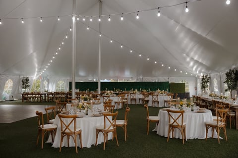 Beautiful tent reception with string lights