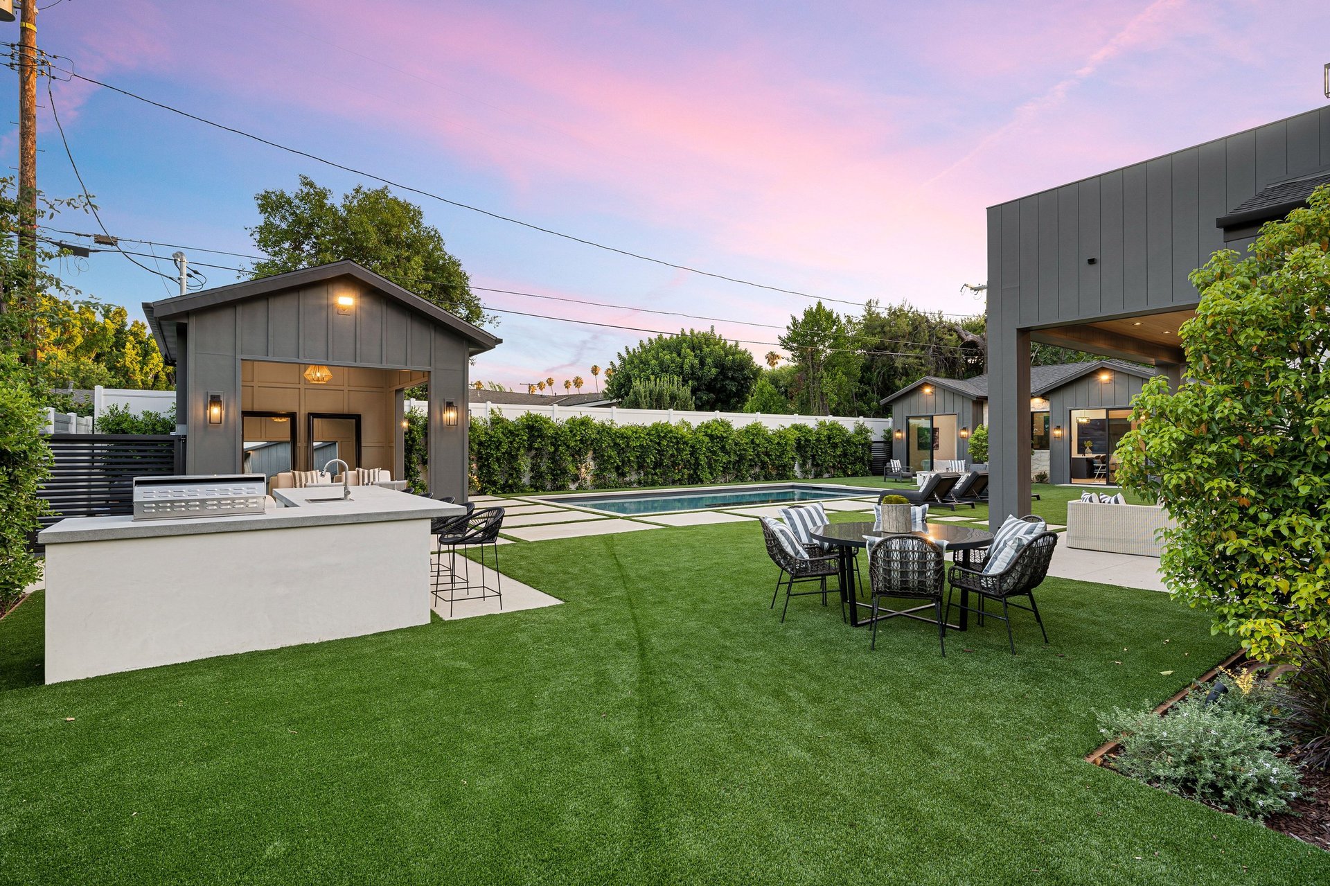 Modern backyard landscape with swimming pool