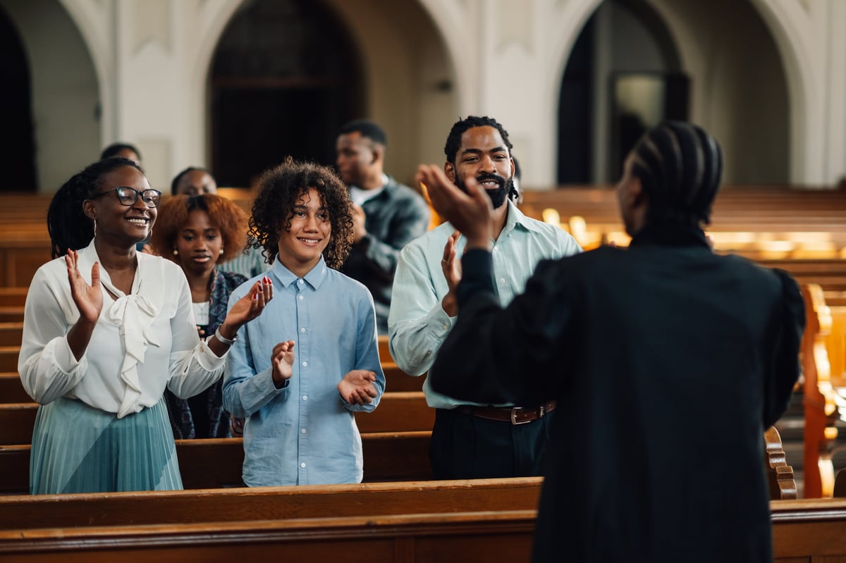 Diverse congregation worshipping together