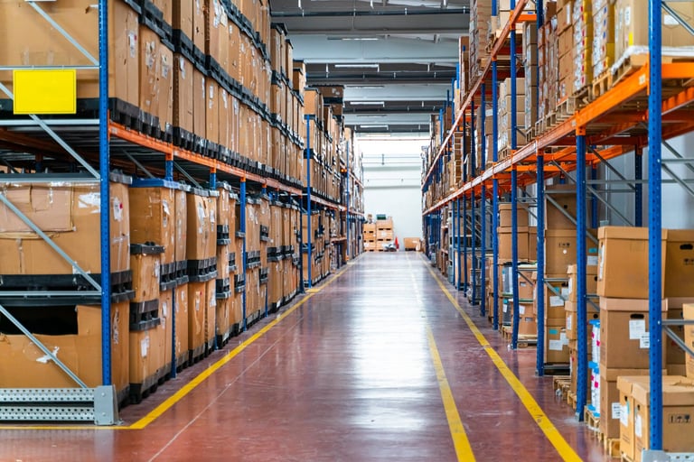 Spacious warehouse interior with tall racking systems