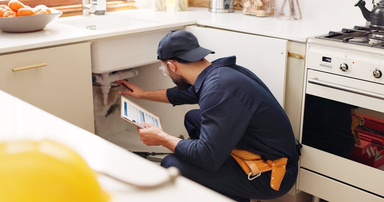 Professional home inspector with clipboard