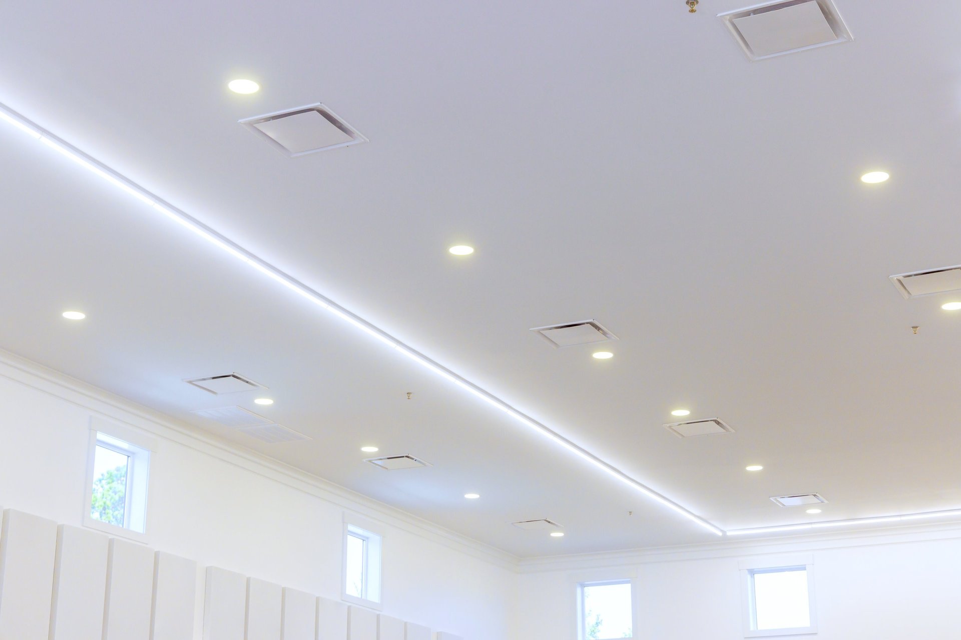Bright modern indoor space with well-designed ceiling featuring multiple LED light fixtures — CN Electrical LED lighting upgrade services in Chilliwack, BC