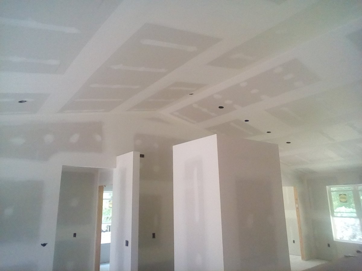 Vaulted ceilings with smooth drywall finish