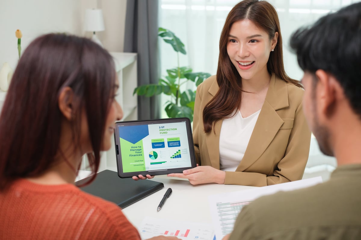 Advisor presenting financial data during a client consultation