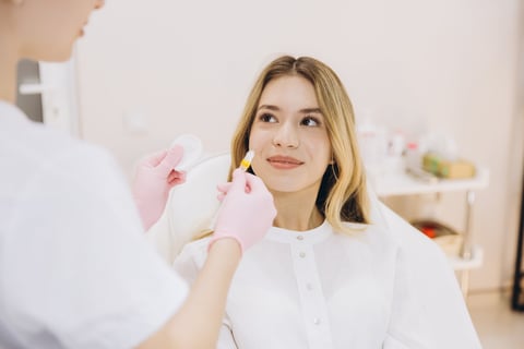 Cosmetologist preparing treatment in clinical setting