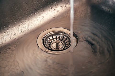 Water in new metallic kitchen sink drain
