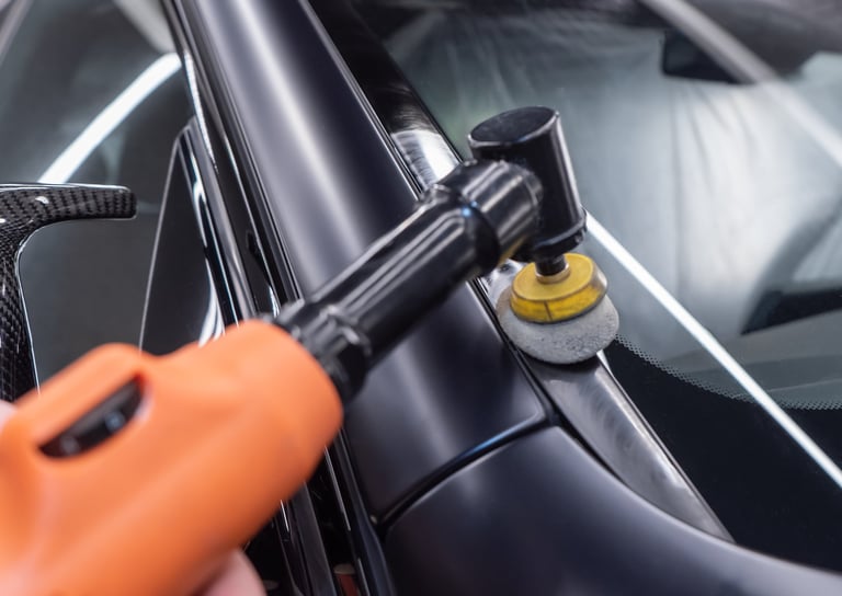 Polishing gray car close-up — professional detailing
