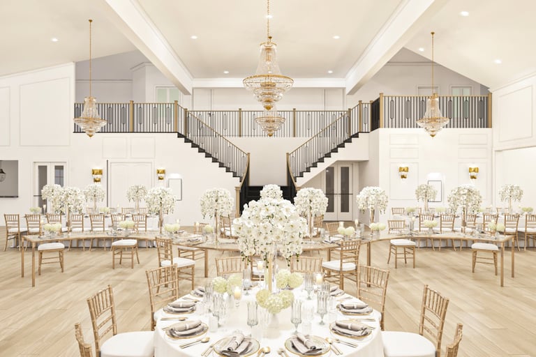 Extravagant ballroom with white floral decor and golden chairs