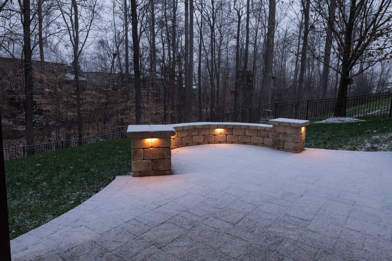 Tranquil backyard patio with stone wall