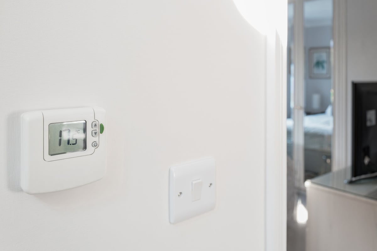 VORA air heater blending into a stylish hallway — heat without compromise