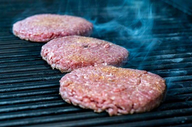 Signature burger on the grill