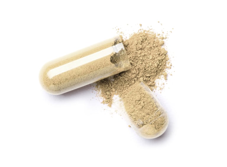 Probiotic supplement capsules and gut-friendly bacteria concept
