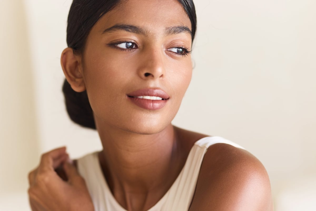 Skincare Beauty Face: Elegant Woman With Smooth Skin, Radiating Natural Glow And Confidence
