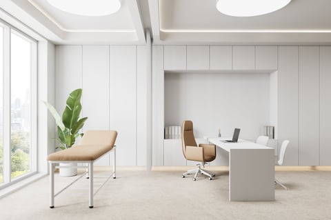 Modern medical treatment room in neutral tones