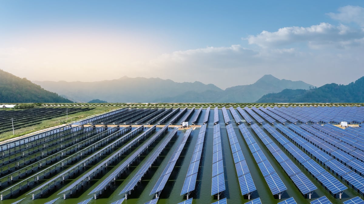 Expansive solar panel array in a mountain landscape