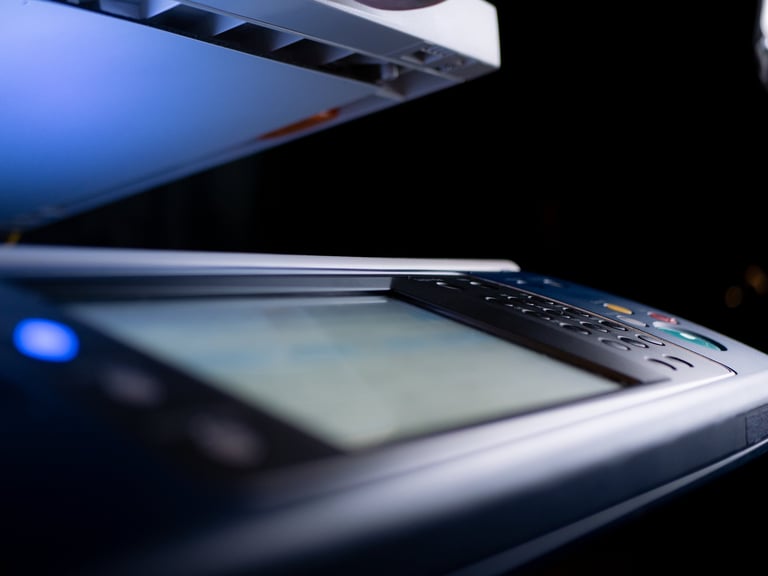 The Evolution of the Office Photocopier: From Analogue to AI