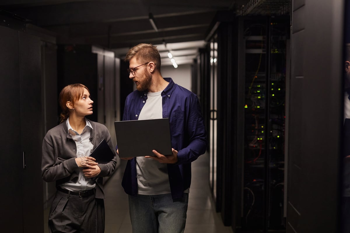 IT professionals working together on business technology infrastructure