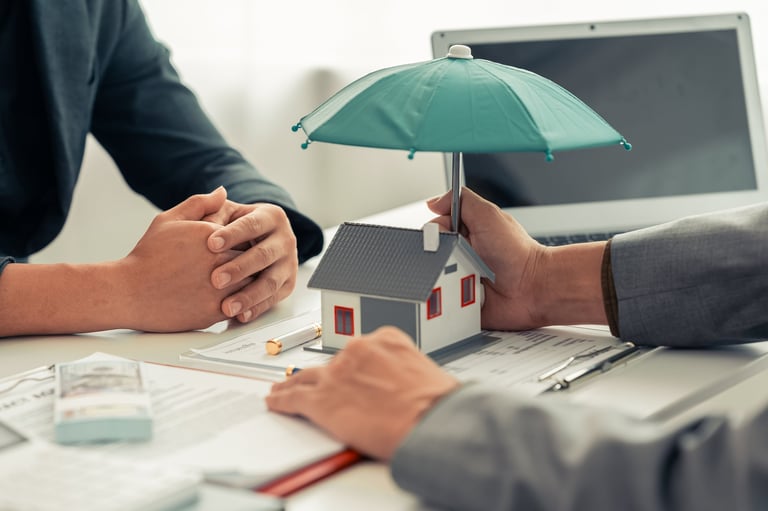 Insurance agent protecting home and personal property
