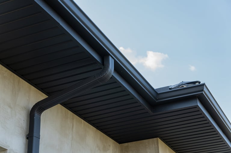 Clean aluminum gutters on residential home