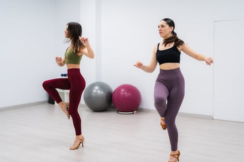 Dancers practicing salsa choreography