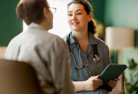 Doctor consulting with female patient