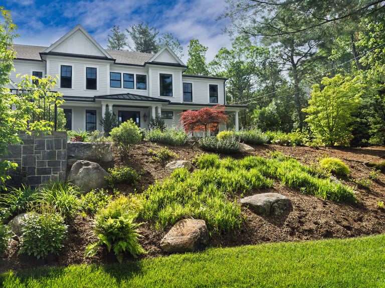 Freshly mulched flower beds on a spring day