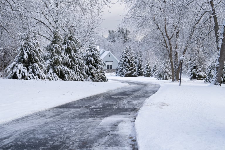 Winter house and driveway after snow storm