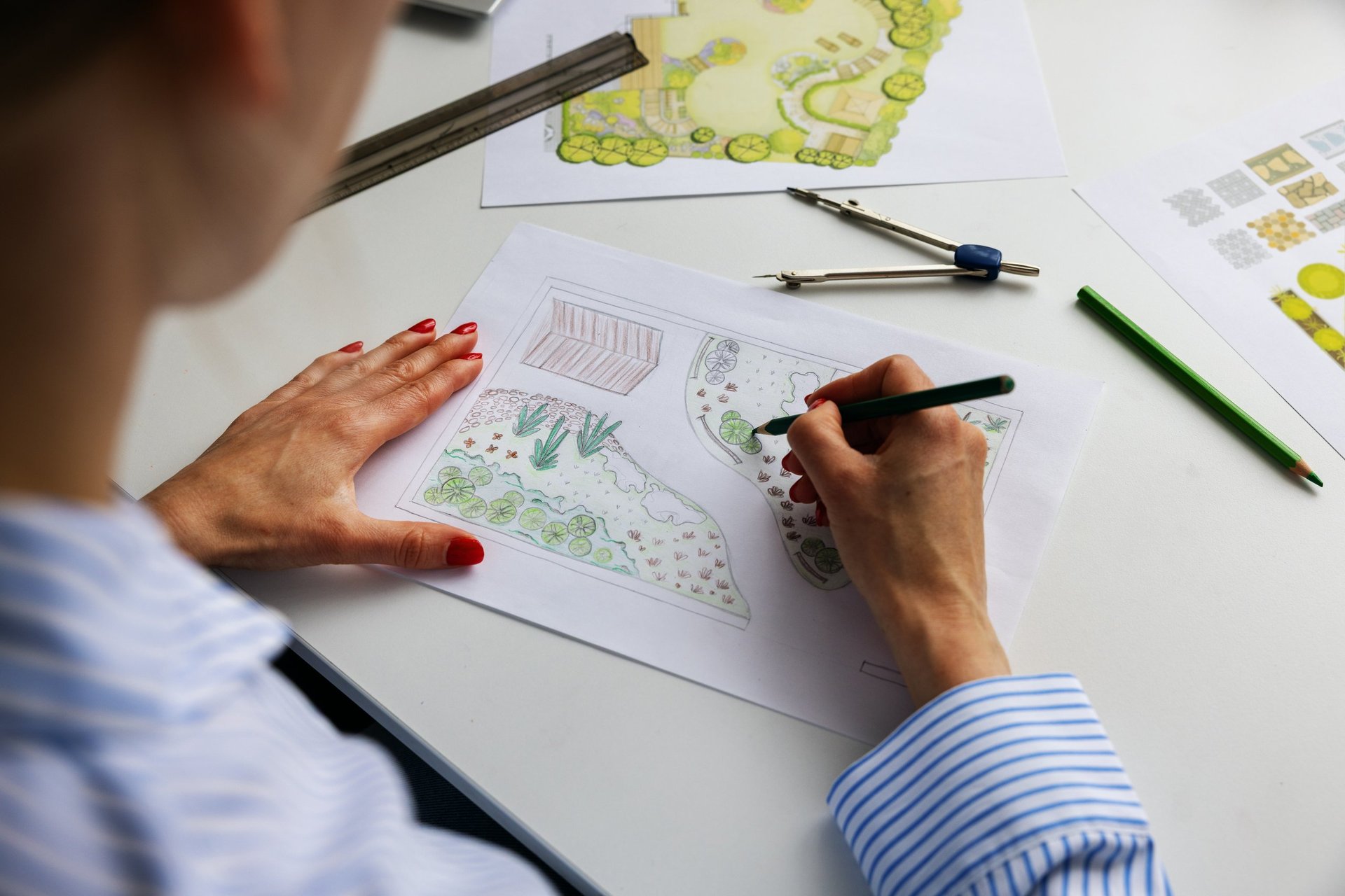 Landscape designer drawing garden plan