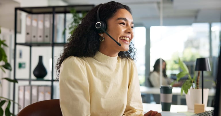 Happy customer service representative helping customers