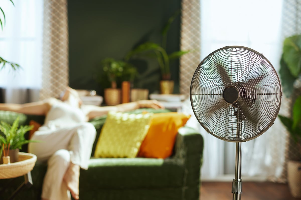 VORA box fan cooling a living room — compact power for summer comfort